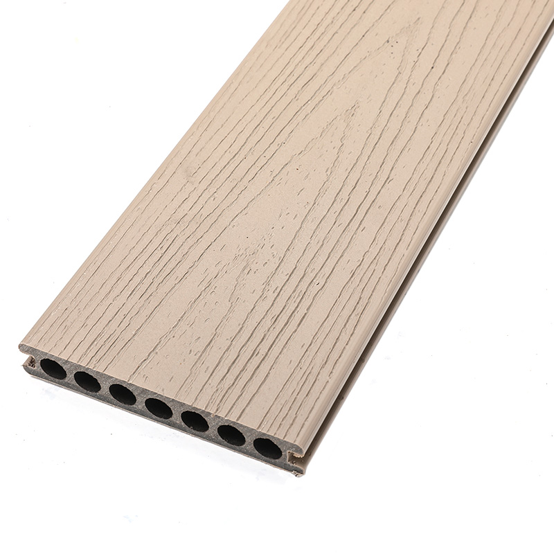 How do the acoustic properties of co-extrusion WPC decking compare to those of traditional decking?