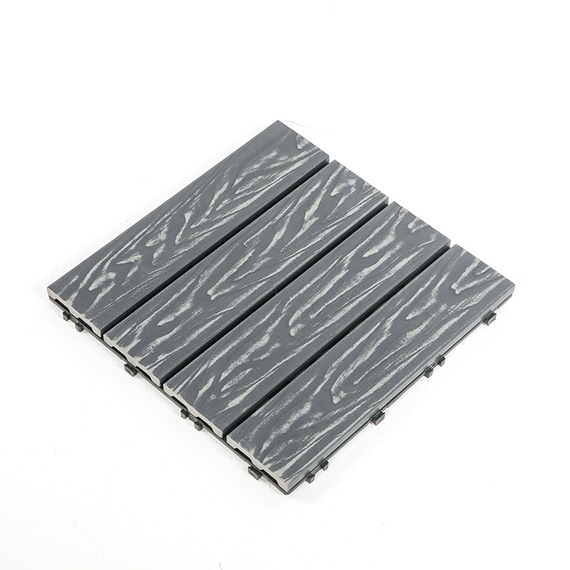 Can WPC interlocking deck tiles be cleaned with a power washer?
